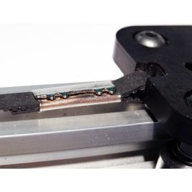 Krimpelhető fogazott szíj rögzítő